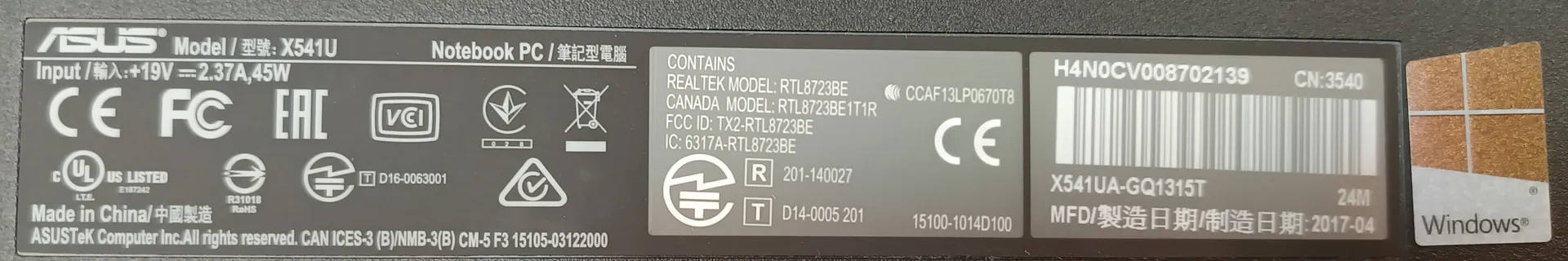 Etykieta ASUS z modelu X541U, zawierająca informacje: 'Notebook PC / 筆記型電腦', 'Input / 輸入: +19V ⎓ 2.37A, 45W', certyfikaty CE, FCC, EAC, VCI, UL US LISTED, znaki RoHS, 'Made in China / 中國製造', dane producenta 'ASUSTeK Computer Inc.', informacje o zawartości 'REALTEK MODEL: RTL8723BE', numery identyfikacyjne 'FCC ID: TX2-RTL8723BE', 'IC: 6317A-RTL8723BE', kod kreskowy z numerem 'H4N0CV008702139', 'CN:3540', 'X541UA-GQ1315T', data produkcji 'MFD/製造日期/制造日期: 2017-04' oraz logo Windows.
