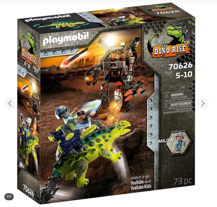 Opakowanie zestawu klocków Playmobil o numerze 70626 z serii Dino Rise. Na pudełku widnieje grafika przedstawiająca walkę między dużym, zielonym dinozaurem z żółtymi kropkami, na którym jedzie figurka w niebieskim stroju i kasku, a wielkim, czerwono-czarnym robotem mechem. W tle widać pustynny krajobraz pod pomarańczowym niebem. Na opakowaniu znajdują się napisy: 'playmobil', 'DINO RISE', '70626', '5-10', '73 pc' oraz informacja o dostępności na YouTube i YouTube Kids. W prawym dolnym rogu widnieje małe zdjęcie figurki z podpisem 'MILOW'.